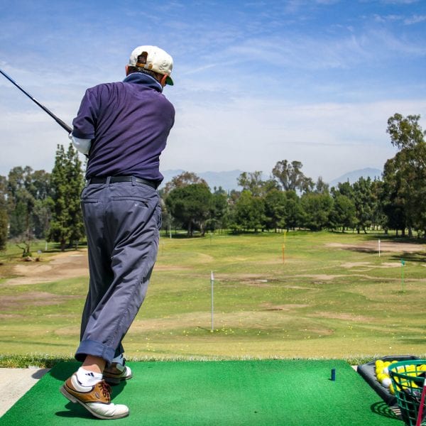 Man hitting a golfball